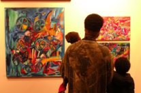 Family looking at art