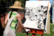 artist Brooke Harker painting a scene from Ghent, Beligum
