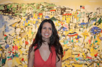 artist Brooke Harker in front of Sunny Days