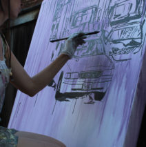 Harker begins painting “Reign of Today”