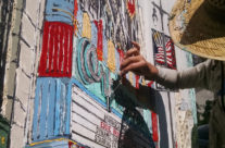 artist painting the Orpheum Theatre in Downtown LA