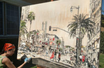 artist painting Hollywood & Vine