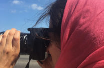 Harker photographing in Cuba