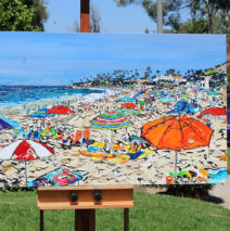 artist with the finished painting This Life