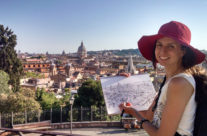 artist Brooke Harker with sketch overlooking Rome
