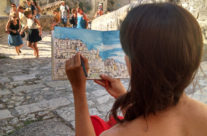 artist Brooke Harker painting in Matera, Italy