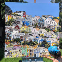 in the final stages of painting “Where Hearts Reside”