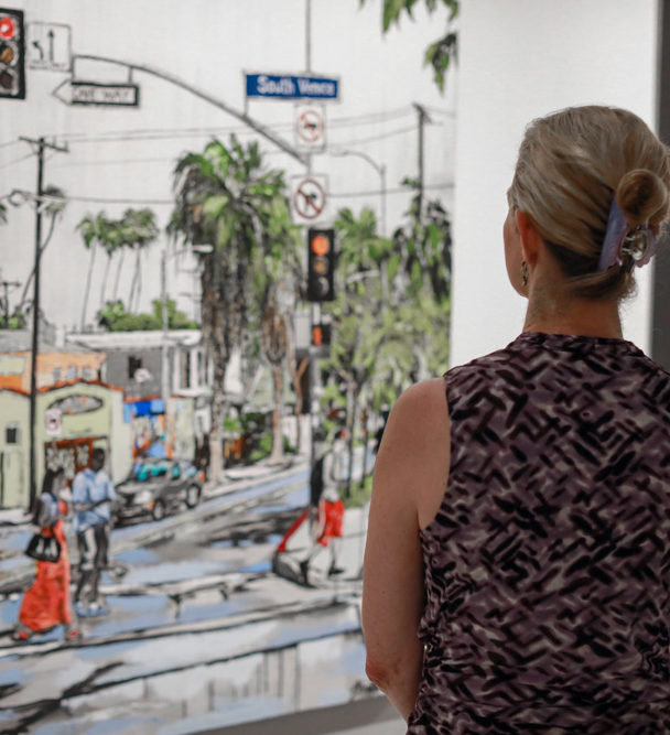 a guest looking at “Boulevard Smile” at Castelli Artspace