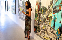 Harker speaking at the artist talk for “Surf & Turf”