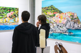 guests looking at “Limoncello Paradise” by Brooke Harker
