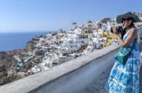 taking photographs in Oia Greece